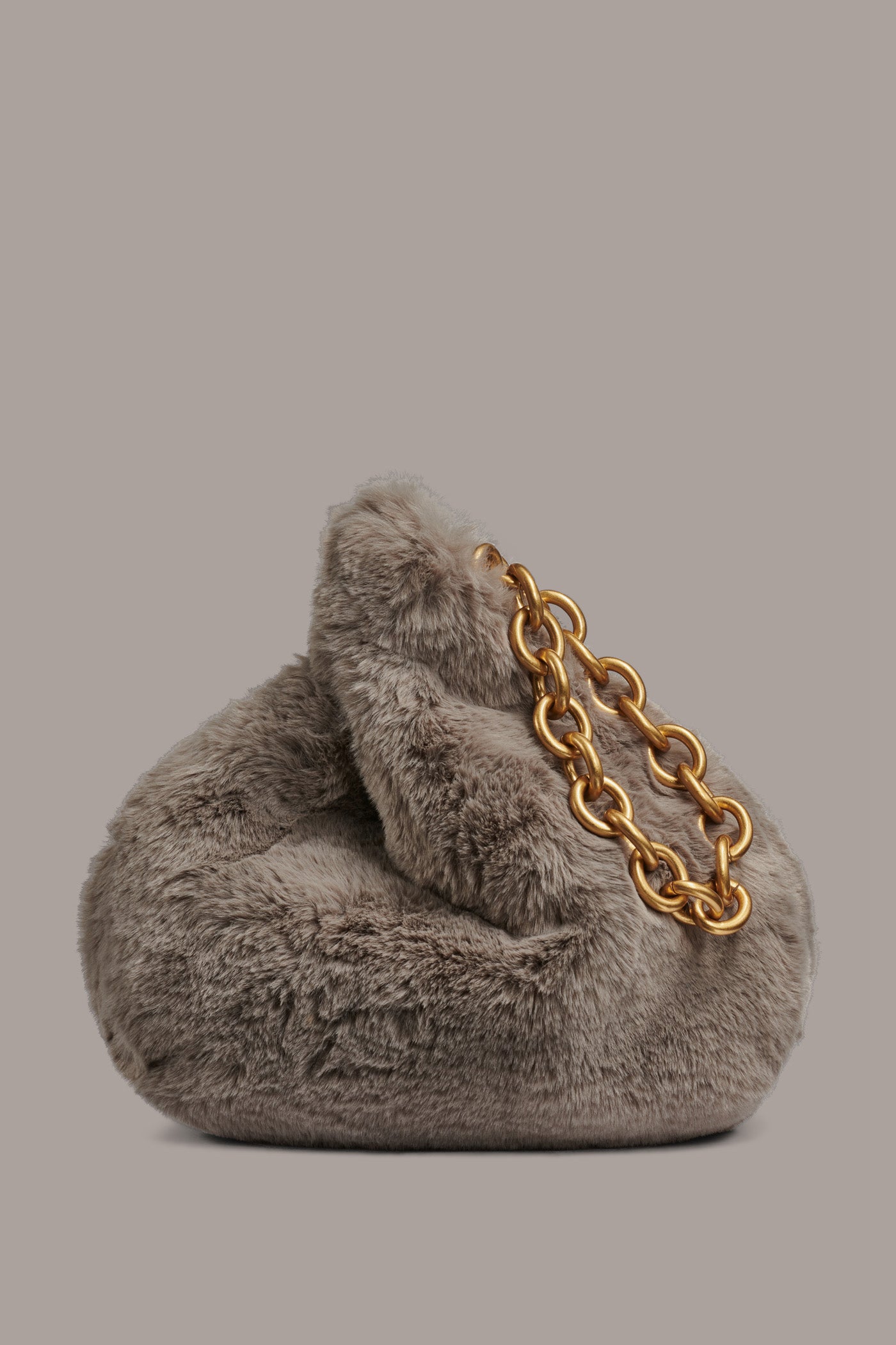 LAWRENCE FAUX FUR WRISTLET | View 1 | Included in discounts LAWRENCE FAUX FUR WRISTLET | View 1 | Included in discounts