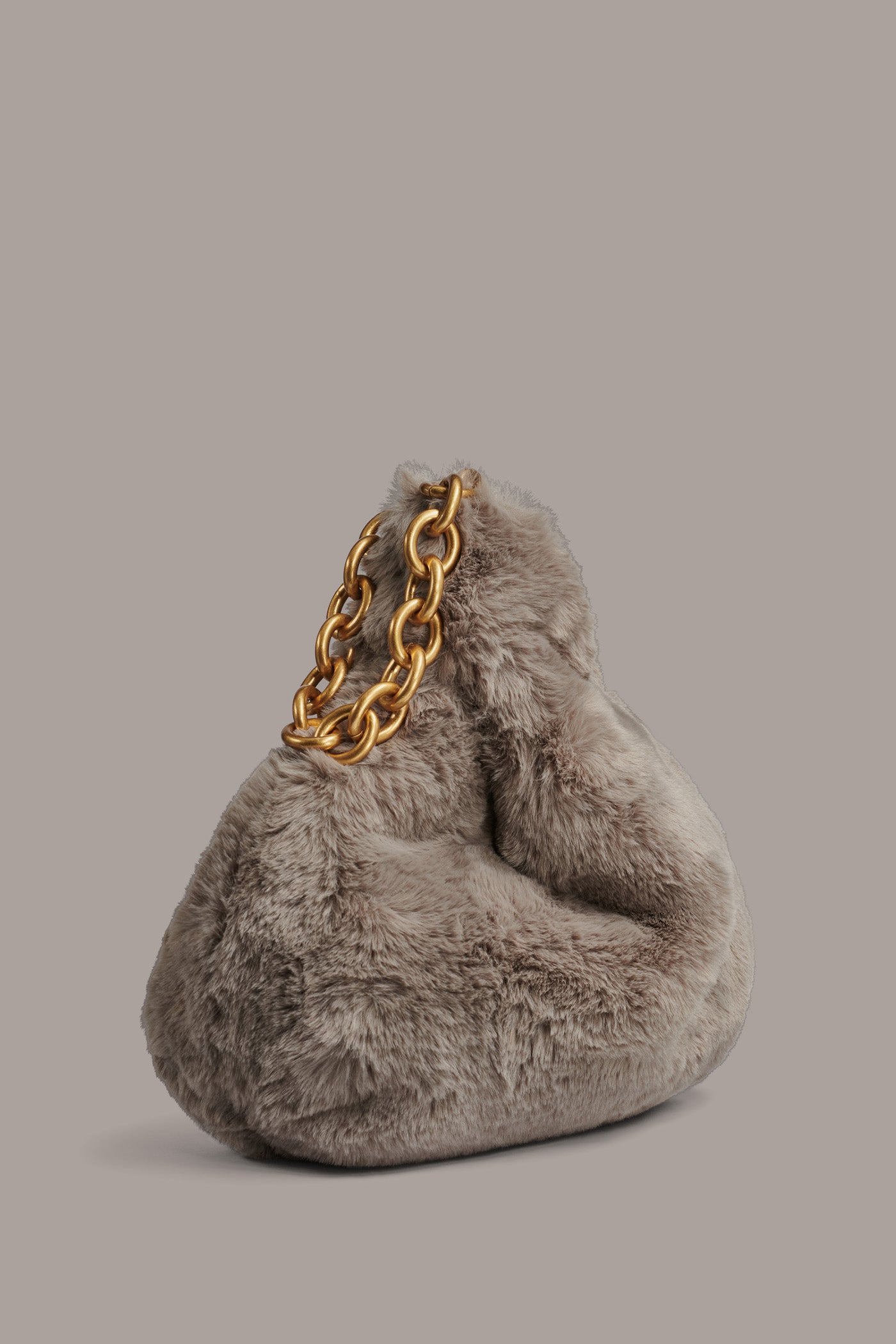 LAWRENCE FAUX FUR WRISTLET VIEW 3 | Included in discounts LAWRENCE FAUX FUR WRISTLET VIEW 3 | Included in discounts