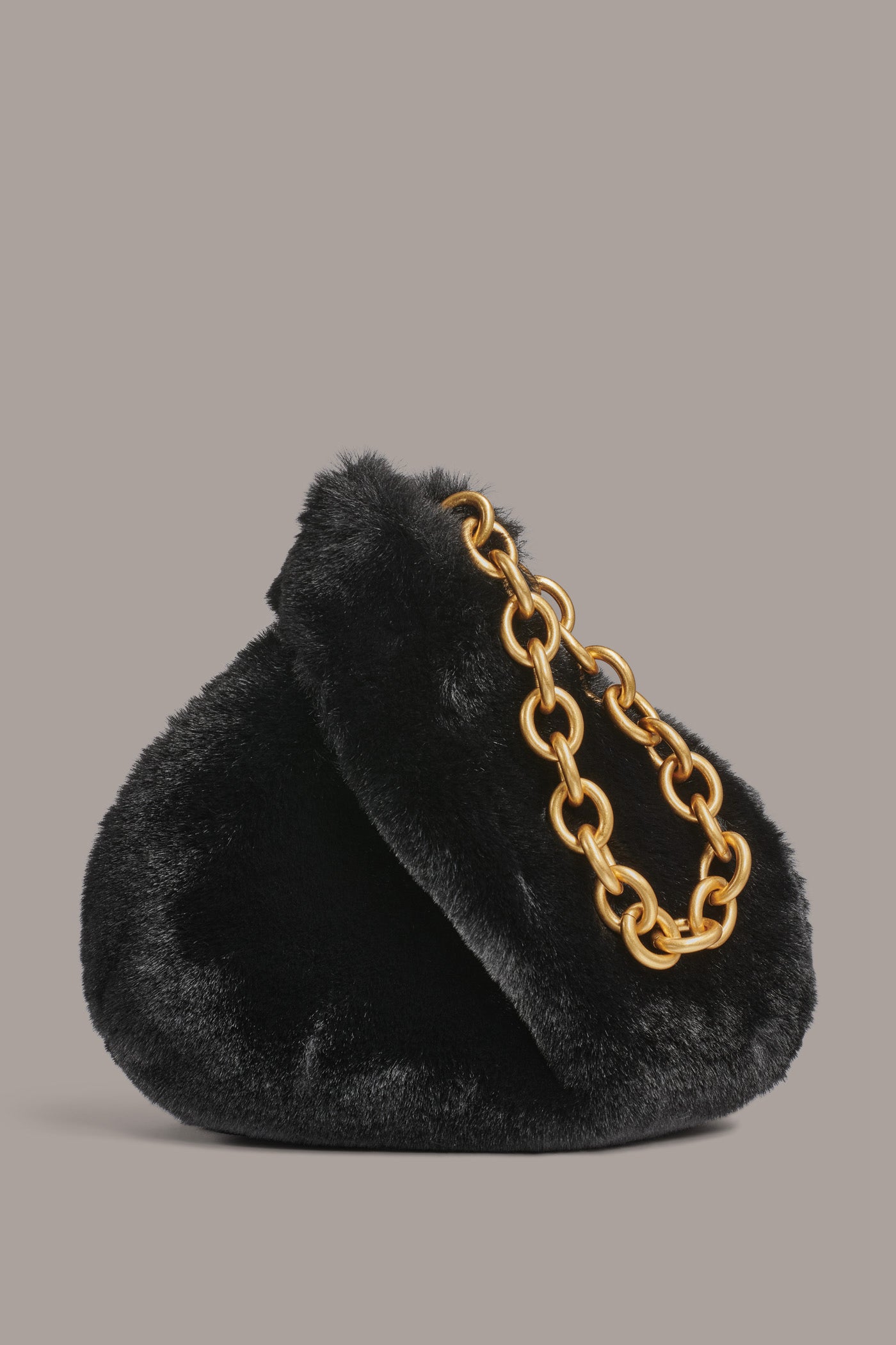 LAWRENCE FAUX FUR WRISTLET | View 1 | Included in discounts LAWRENCE FAUX FUR WRISTLET | View 1 | Included in discounts