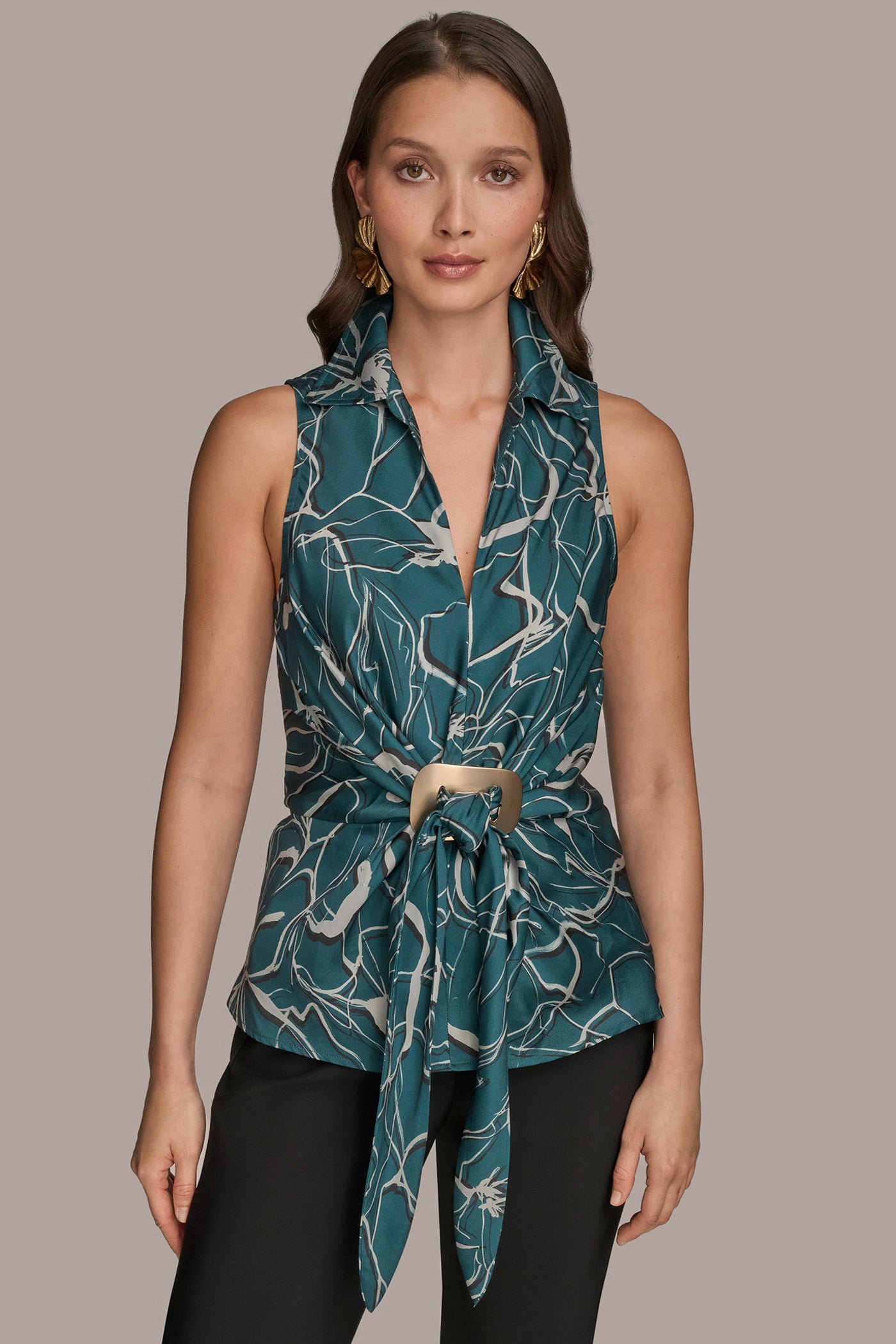 PRINTED SLEEVELESS FAUX WRAP TOP WITH HARDWARE | View 1 | Included in discounts PRINTED SLEEVELESS FAUX WRAP TOP WITH HARDWARE | View 1 | Included in discounts