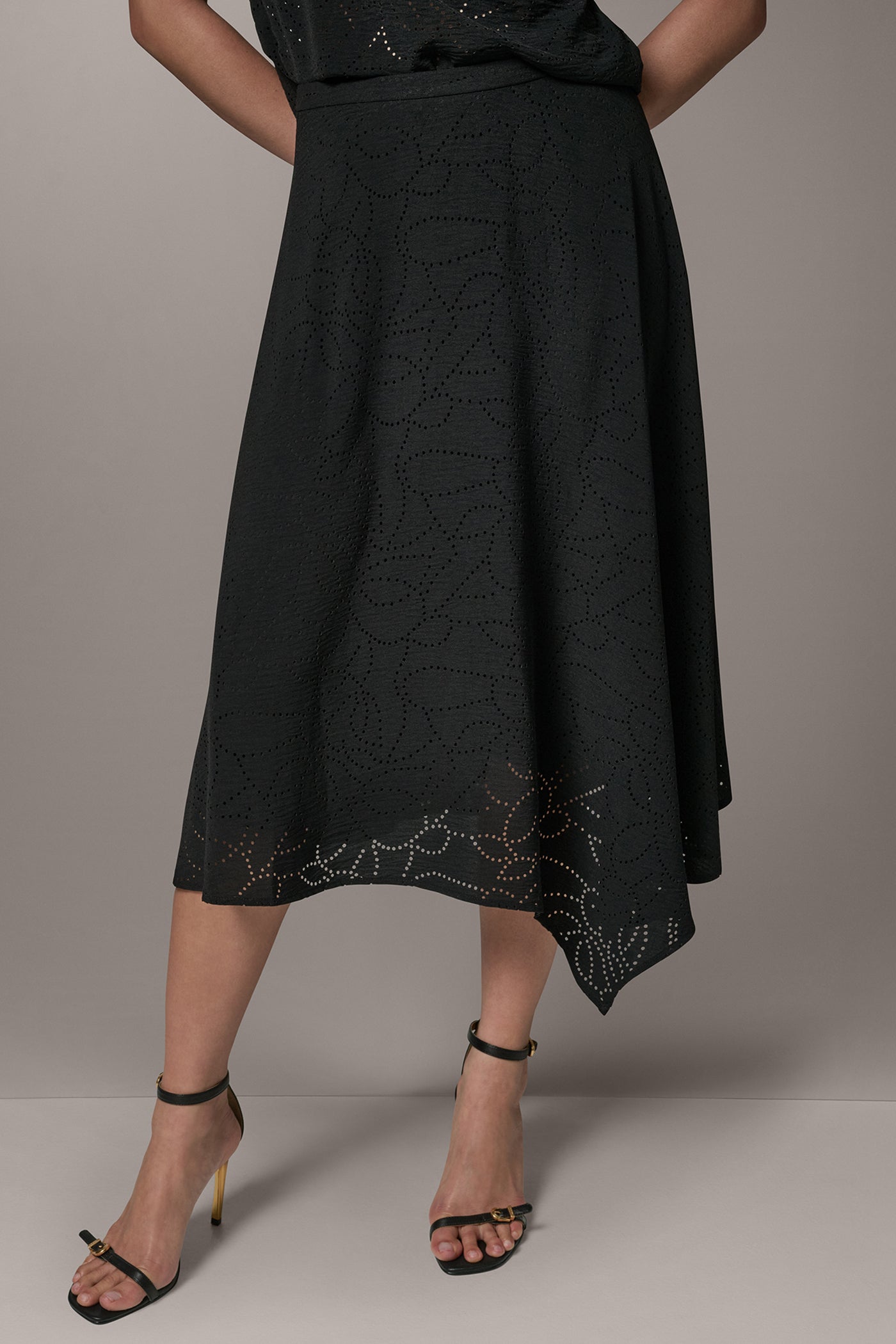 LASER CUT ASYMMETRIC MIDI SKIRT