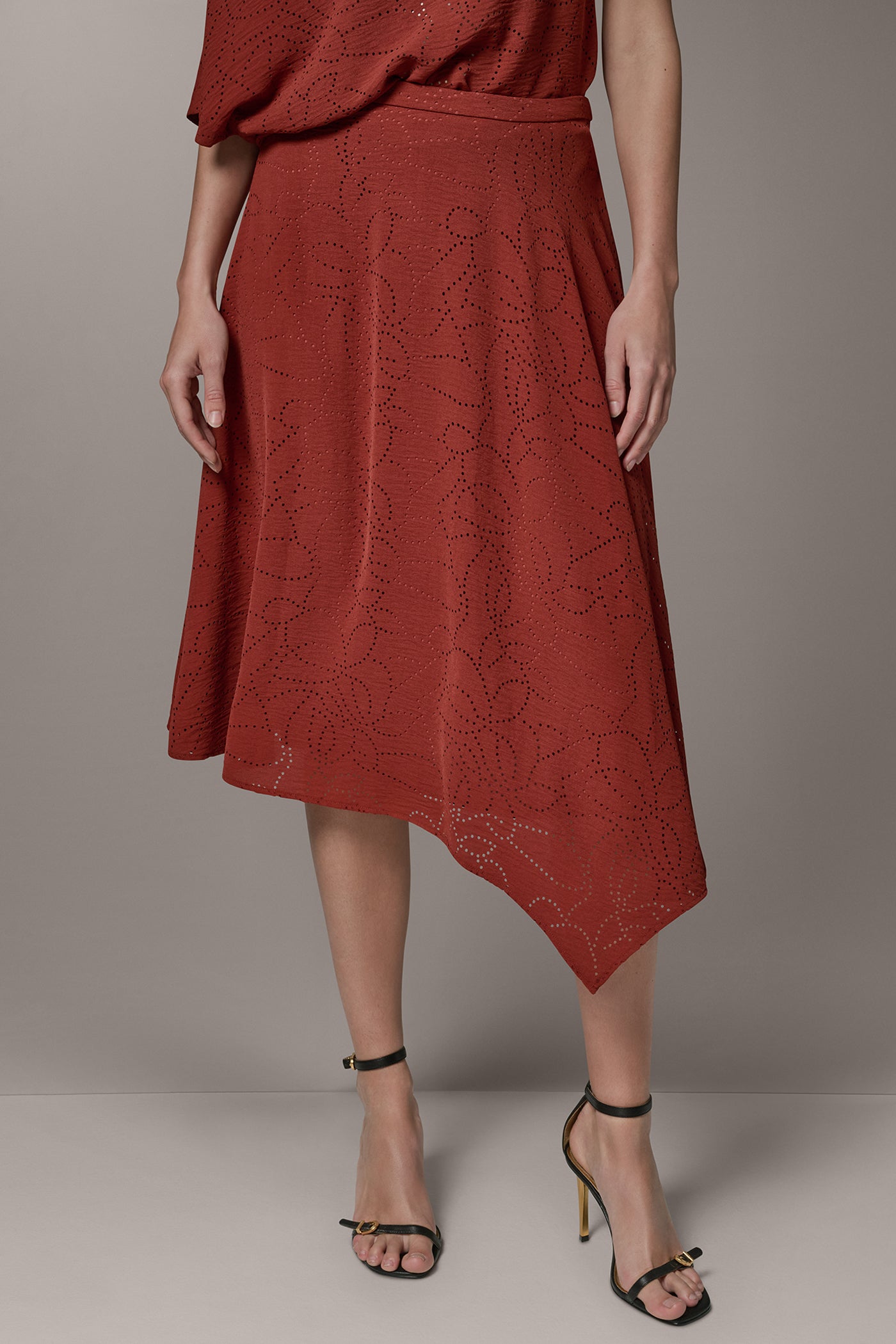 LASER CUT ASYMMETRIC MIDI SKIRT