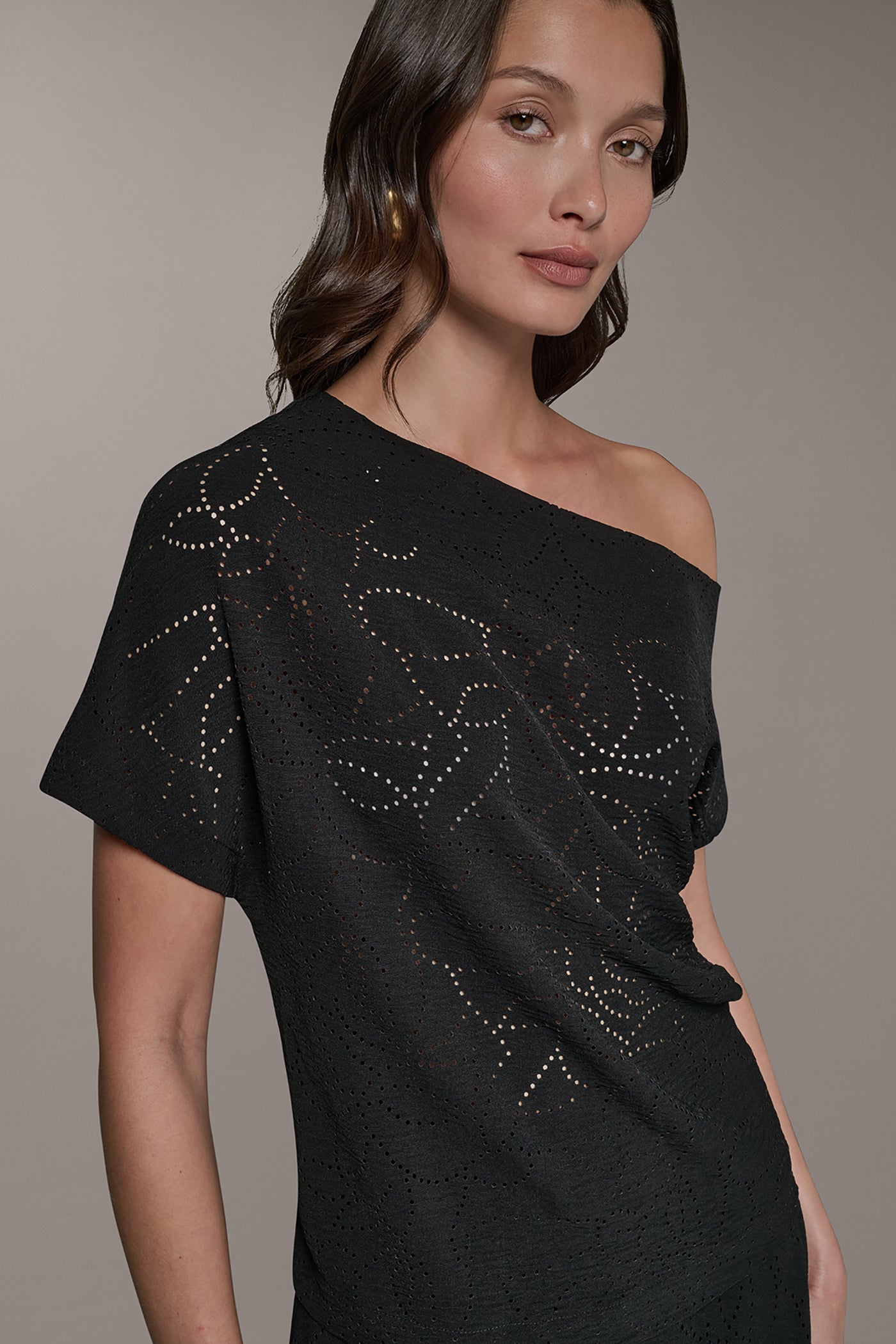 SLEEVELESS ASYMMETRIC LASER CUT TOP (alternate view)